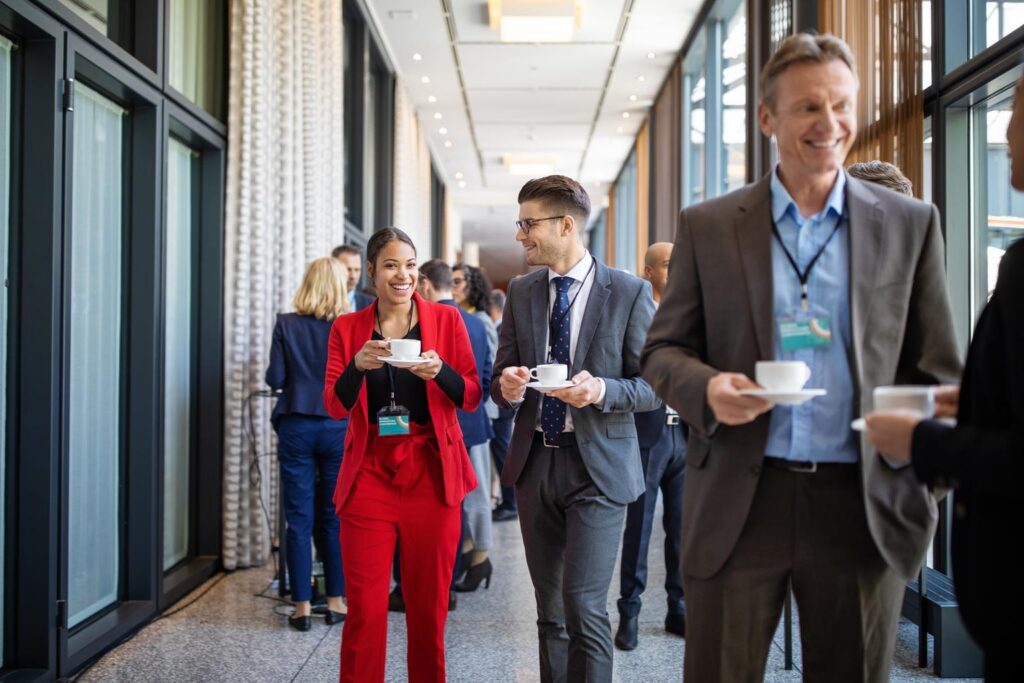 Business conference delegates at hotel MICE venue