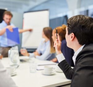 Hospitality training services workshop with a trainer delivering a session to hotel staff